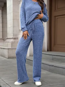Soft blue knitted long sleeve loungewear set with ribbed texture and drawstring pants