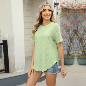 Detailed view of women's light green round neck T-shirt with diamond jacquard knit texture