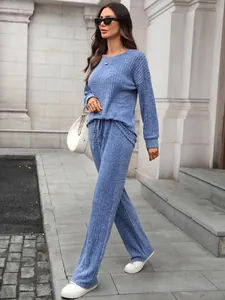 Women's blue ribbed knit two-piece lounge set with long sleeve top and wide leg pants