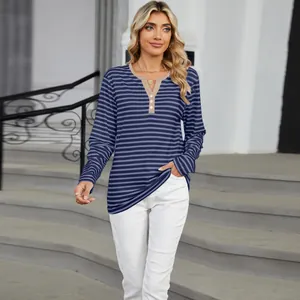 Long sleeve women's t-shirt with blue horizontal stripes and a V-neck color-block detail.