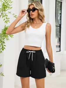 Model wearing black drawstring casual sports shorts with white side stripes.