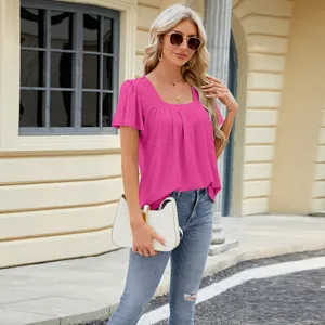 Elegant pink square neck blouse with eyelet lace details and short flutter sleeves