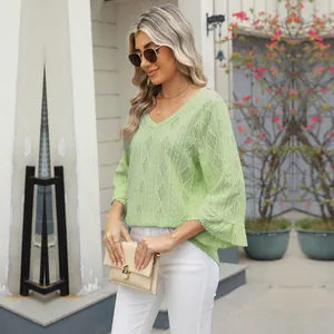Detail view of light green V-neck hollowed-out jacquard bell sleeve top for women