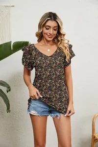 Close-up detail of the floral print and double-layered ruffle sleeves on this V-neck top