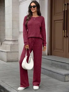 Cozy burgundy ribbed knit two-piece lounge set with long-sleeve top and trousers for women