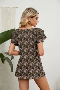 Elegant back view of women's floral loose top with double-layer ruffle sleeves