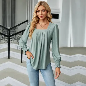 Detailed view of women's sage green jacquard square neck long sleeve pleated top