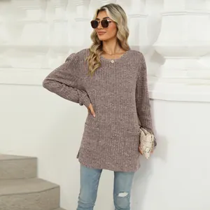 Women's long-sleeve ribbed knit tunic with bubble sleeves and pockets in dusty mauve.