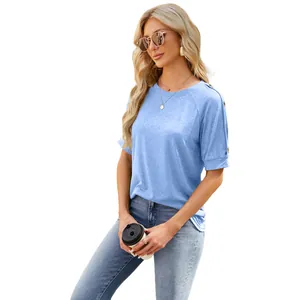 Casual women's light blue raglan sleeve t-shirt with shoulder button detail and crew neck