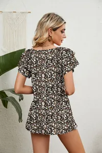 Back view of a summer floral print top with double ruffle sleeves and loose fit