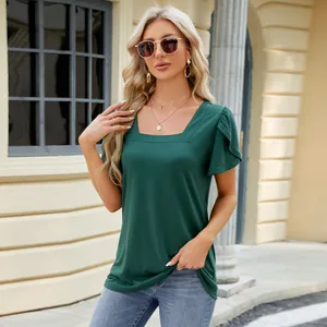 Close-up view of a green square-neck T-shirt featuring elegant petal sleeves and a loose fit