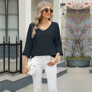 Women's black V-neck T-shirt featuring diamond hollow jacquard and stylish flare sleeves