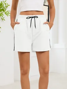 Front view of white casual sports shorts with black drawstring and side stripes.