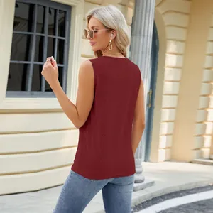 Back view of a burgundy sleeveless jacquard top for women in an outdoor setting