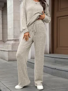 Cozy ribbed knit loungewear set featuring crew neck long sleeve top and matching pants