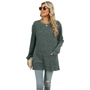 Casual loose-fit women's long sleeve ribbed knit tunic top featuring dual front pockets