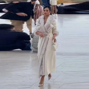 Full body view of elegant white wool coat with grey fur collar on an Asian model