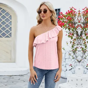 Close-up showing the delicate ruffled eyelet embroidery of pink one-shoulder top for women