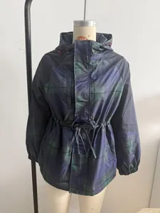 Front macro view of a plaid windbreaker jacket featuring an adjustable drawstring waist design