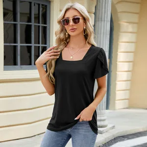 Detail of stylish black square neck T-shirt featuring feminine ruffled petal sleeves