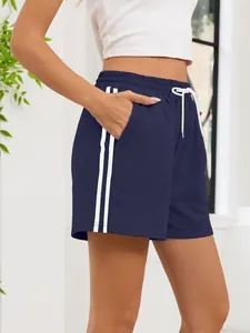 Women's navy blue athletic shorts with white side stripes and drawstring detail for summer
