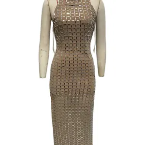 Elegant women's nude mesh halter midi dress featuring silver sequin grid detailing.