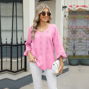 Stylish pink V-neck t-shirt featuring diamond pointelle knit and elegant bell sleeves.