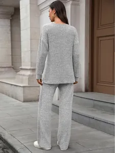 Back view of gray ribbed knit lounge set featuring long-sleeve top and wide-leg trousers