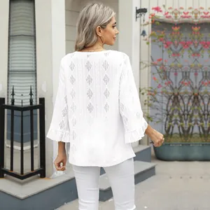 Back view of white hollow jacquard bell sleeve t-shirt with diamond pattern texture