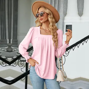 Elegant pink jacquard pleated square neck long sleeve T-shirt for women displayed on a model