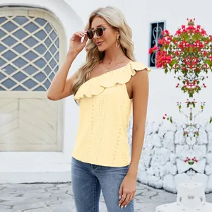 Elegant pale yellow one-shoulder top featuring ruffled eyelet detailing for summer fashion
