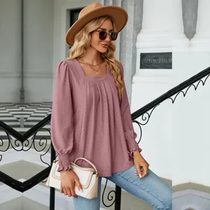Detail view of mauve jacquard square neck blouse with pleated texture and ruffles