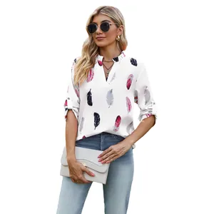 Women's V-neck loose shirt featuring a colorful feather print and three-quarter sleeves.