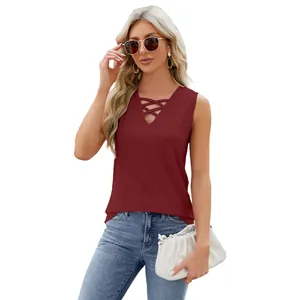 Sleeveless burgundy jacquard V-neck tank top featuring crisscross strappy detail