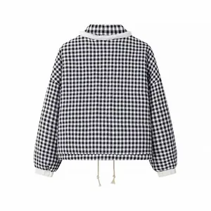 Back view of a black and white gingham puffer jacket with drawstring hem and fleece collar.