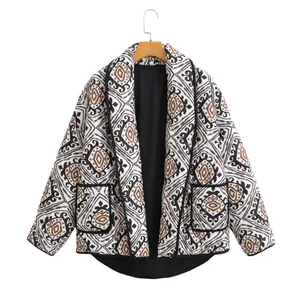 Detail view of ethnic print quilted jacket with black contrast trim and lining