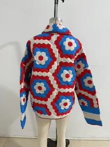 Back view of women's quilted kimono jacket with red and blue hexagon print
