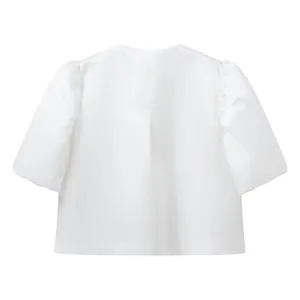 Back view of elegant white satin puff sleeve cropped blouse with a loose fit for women