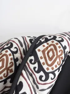 Close-up view showing the ethnic print and quilted texture of this fashion cotton coat