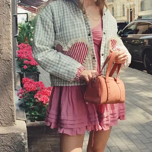 Street style gingham quilted jacket for women featuring a red striped heart patch design