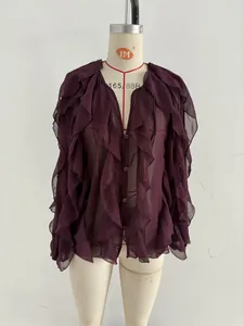Detailed view of elegant deep purple V-neck chiffon blouse with layered ruffles