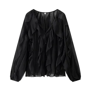 Detailed view of elegant black V-neck chiffon shirt featuring layered ruffle decoration
