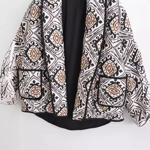 Women's quilted jacket with geometric tribal print and faux two-piece design