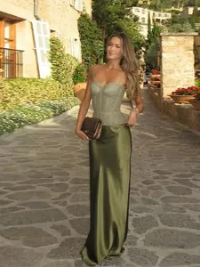 Elegant olive green lace corset top paired with a flowing silky satin maxi skirt outfit