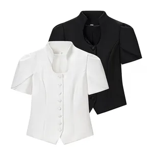 Detail of slim fit short sleeve blouses in black and white with stand collar buttons