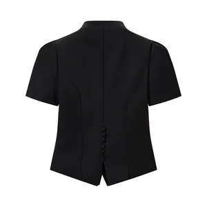 Detailed back view of a slim-fit black short-sleeve top featuring buttons and a back slit