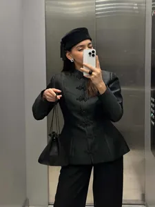 Elegant black Chinese-style jacket with stand collar and traditional frog buttons