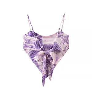 Detailed close-up of a purple tie-dye handkerchief camisole with decorative front bow
