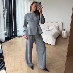 Elegant grey long sleeve peplum top and wide leg pants two-piece set for women