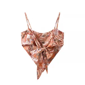 Detail view showing the bohemian paisley print and tie-knot design of the camisole
